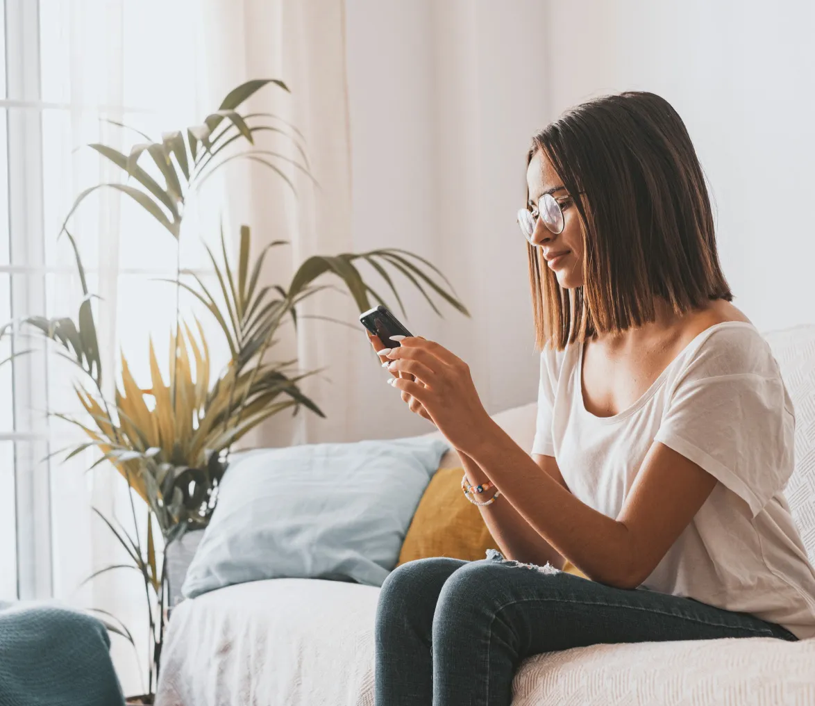 woman holding mobile in hand